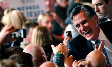 

Mitt Romney greets supporters following his Nevada caucus victory over Newt Gingrich Photograph: Gerald Herbert/AP
