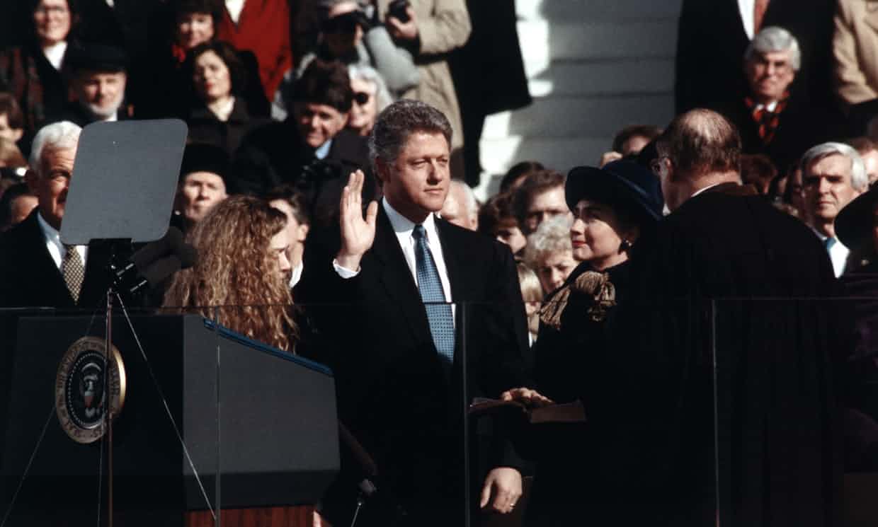 
 Hillary Clinton, right, looks on as her husband Bill is sworn in as president in 1992. Photograph: Everett/Rex/Shutterstock
