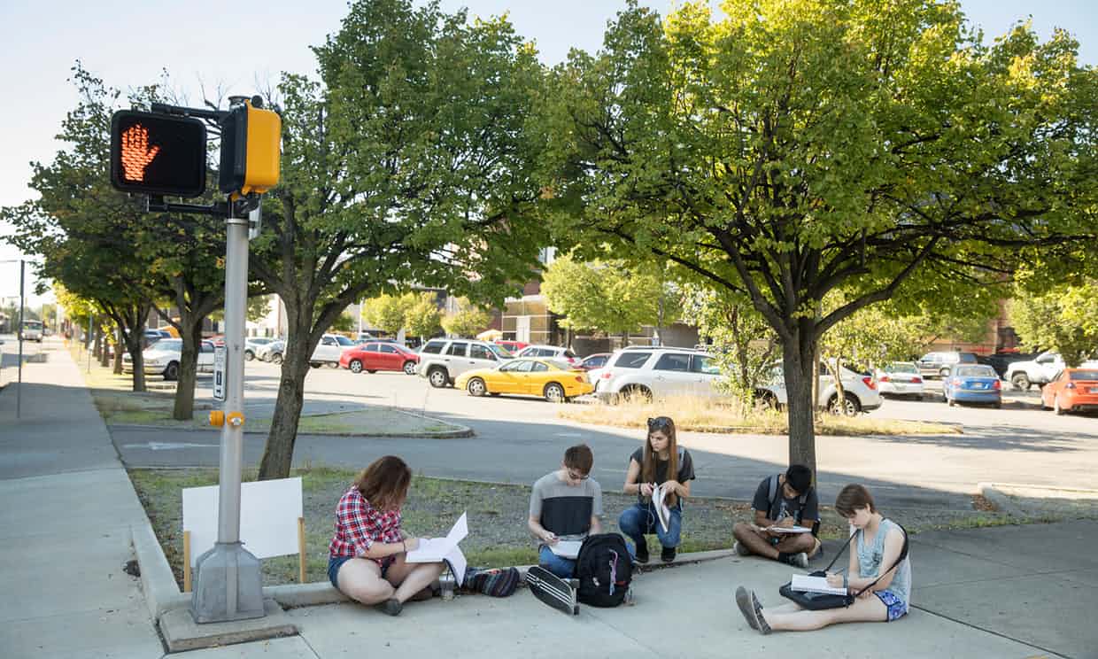 A group of freshman architecture students from Ball State University drawing in downtown Muncie. Ari 18, left and Noah 19, second left, both express their discontent with politics and say they will vote for neither Donald Trump or Hilary Clinton. T