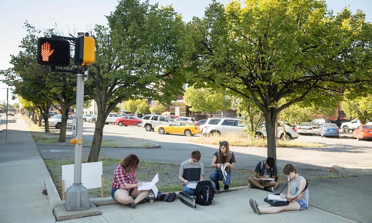 
 A group of freshman architecture students from Ball State University drawing in downtown Muncie. Ari 18, left and Noah 19, second left, both express their discontent with politics and say they will vote for neither Donald Trump or Hilary Clinton. T