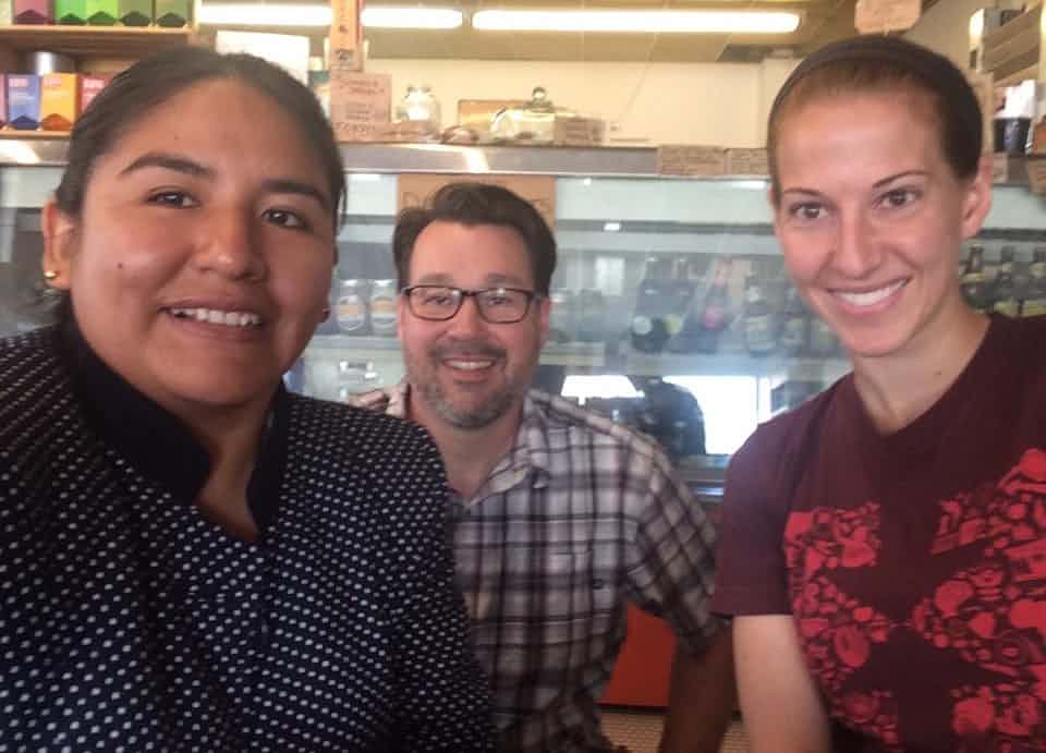 
 Dave Ring, (c) with Rachel Dana (r) from Equal Exchange and Angela Caquegua (l) who visited the Downtown Farm Stand from Bolivia this month. Angela is part of the Young Leaders of The Americas Initiative which is an Obama Administration program thr