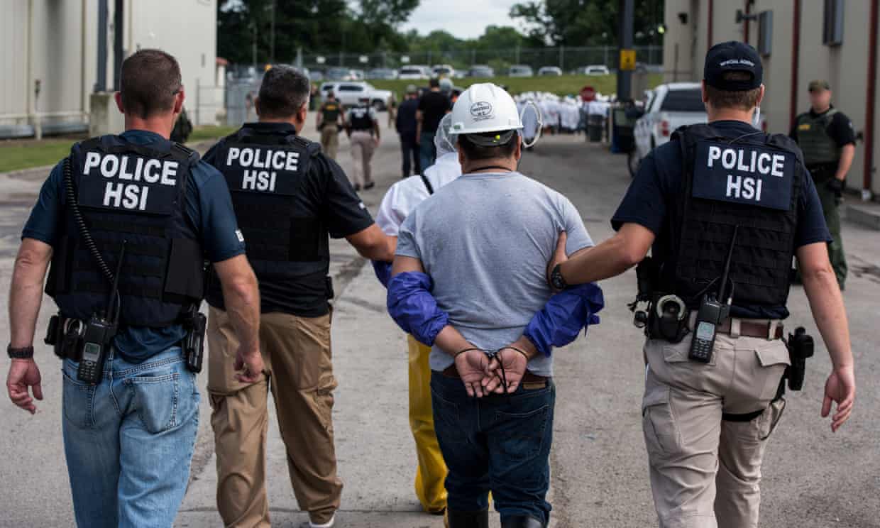 

A man is taken away by immigration agents in Ohio. Trump’s rhetoric has given license for citizens to vent their bigotry.
Photograph: Smith Collection/Gado/Getty Images
