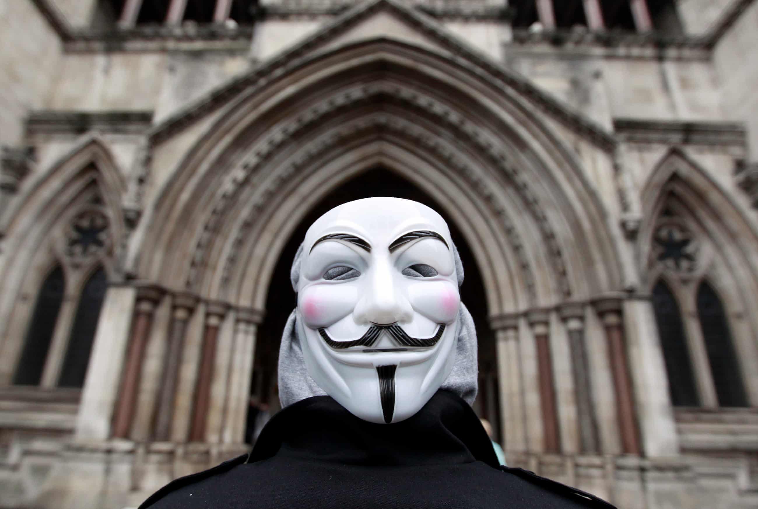 

A member of Occupy London outside the High Court in January 2012. Photograph: Reuters
