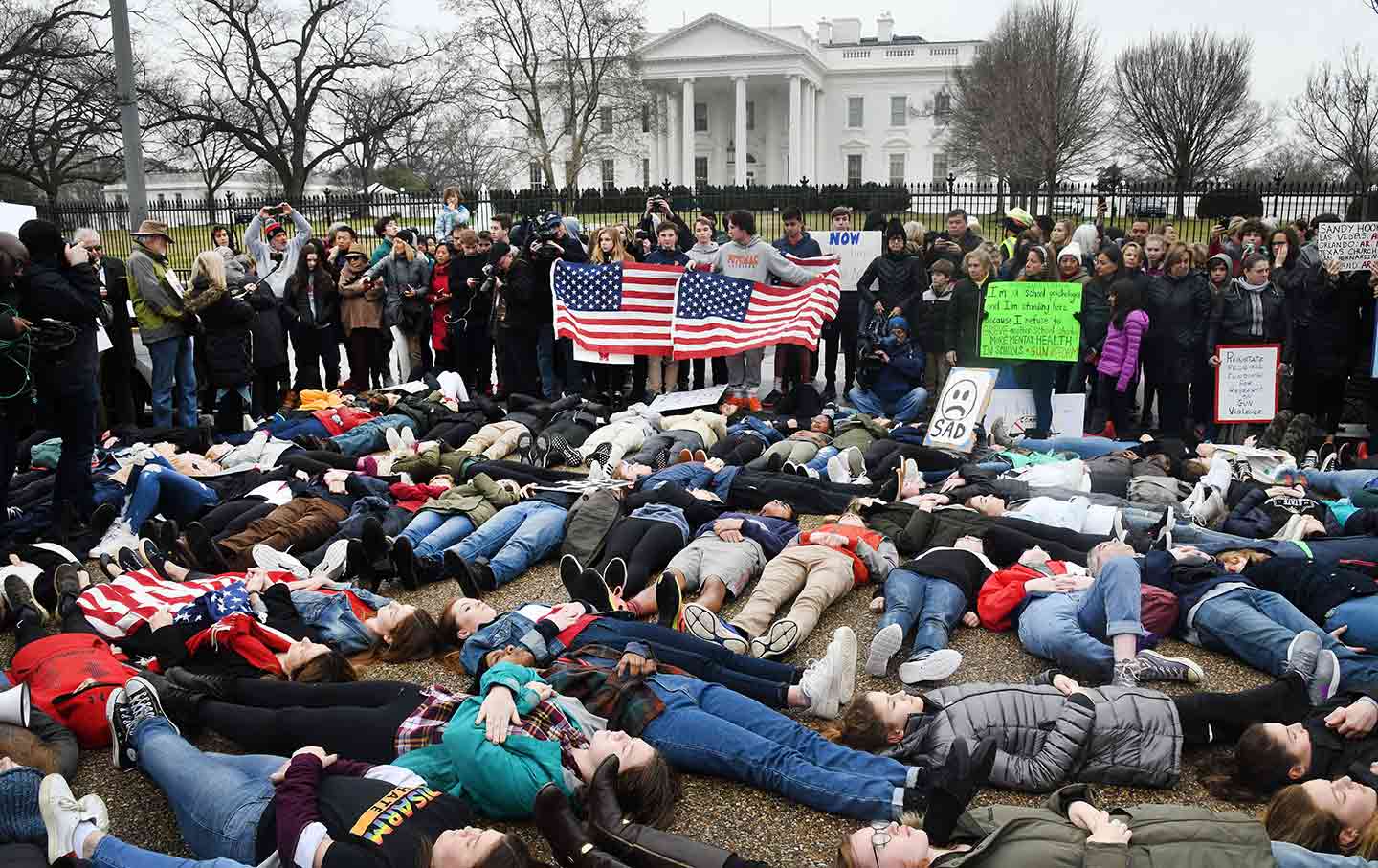 Students take part in a lie-in outside of the White House, February 19, 2018. (AP)